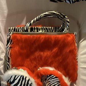 Ashro Faux Fur Zebra-Trim Handbag in Bright Orange and matching booties